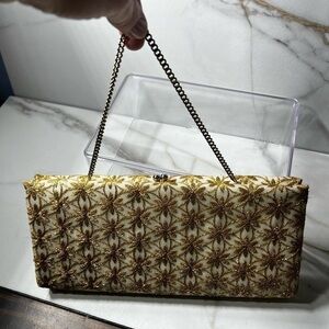 White and gold vintage clutch 10 1/2‎ long x 5 1/2 tall.
